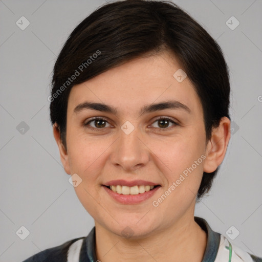 Joyful white young-adult female with short  brown hair and brown eyes