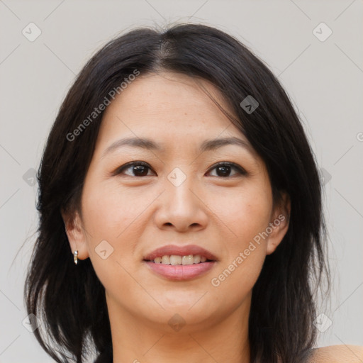 Joyful asian young-adult female with medium  brown hair and brown eyes