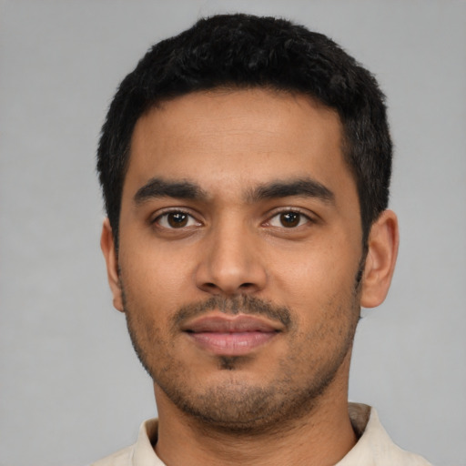 Neutral latino young-adult male with short  black hair and brown eyes