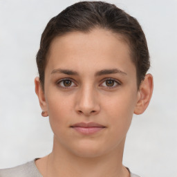 Neutral white young-adult female with short  brown hair and brown eyes