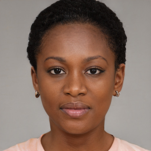 Neutral black young-adult female with short  brown hair and brown eyes