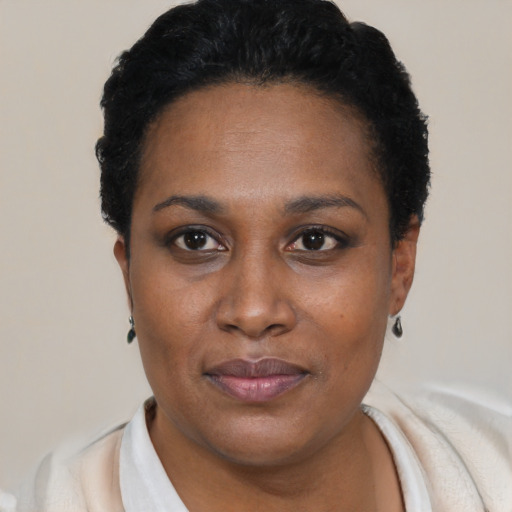 Neutral black young-adult female with short  black hair and brown eyes