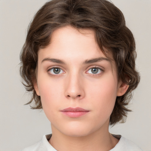 Neutral white young-adult female with medium  brown hair and green eyes