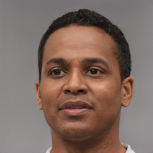 Neutral black young-adult male with short  black hair and brown eyes
