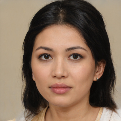 Neutral asian young-adult female with medium  brown hair and brown eyes