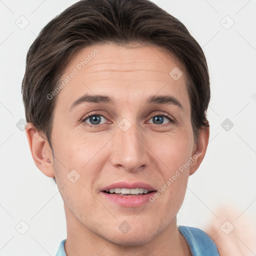 Joyful white adult female with short  brown hair and brown eyes