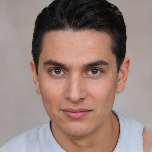 Joyful white young-adult male with short  brown hair and brown eyes