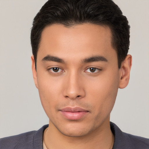 Neutral latino young-adult male with short  brown hair and brown eyes