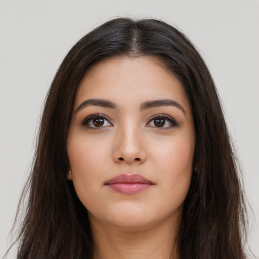 Neutral latino young-adult female with long  brown hair and brown eyes