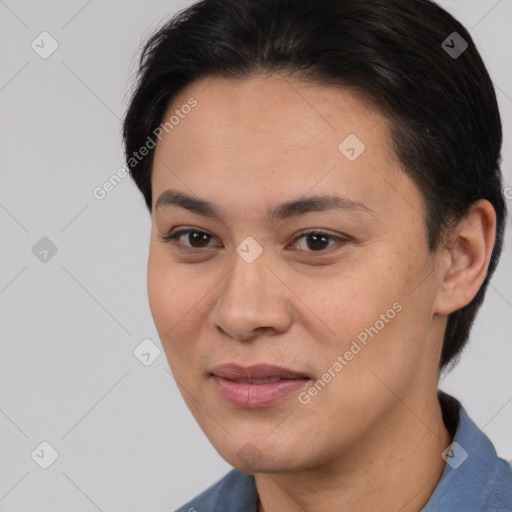 Joyful asian young-adult female with short  brown hair and brown eyes