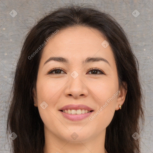 Joyful asian young-adult female with long  brown hair and brown eyes