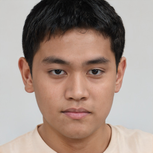 Neutral asian young-adult male with short  brown hair and brown eyes