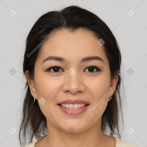 Joyful latino young-adult female with medium  brown hair and brown eyes