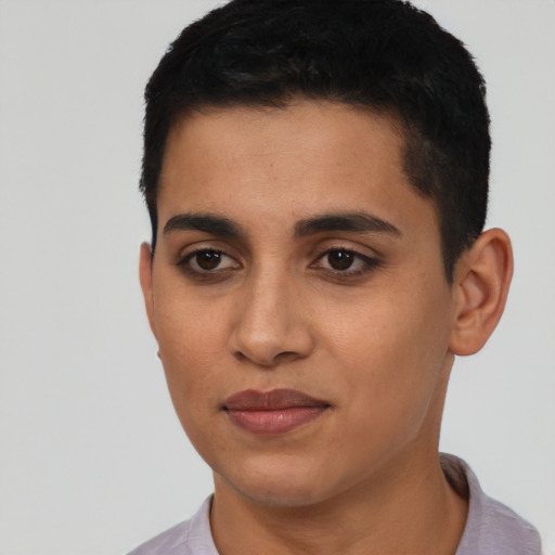 Joyful latino young-adult male with short  black hair and brown eyes