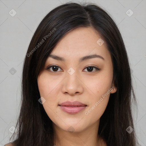 Joyful asian young-adult female with long  brown hair and brown eyes