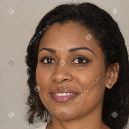 Joyful black young-adult female with medium  brown hair and brown eyes