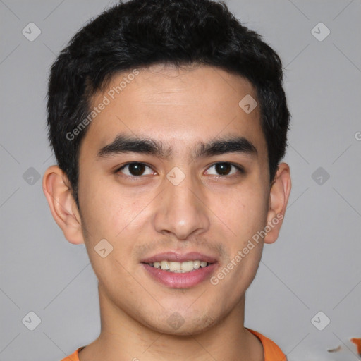 Joyful latino young-adult male with short  black hair and brown eyes