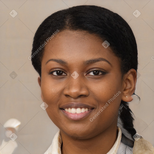 Joyful latino young-adult female with short  black hair and brown eyes