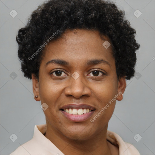 Joyful black young-adult female with short  brown hair and brown eyes