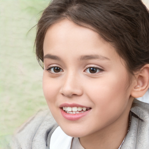 Joyful white child female with short  brown hair and brown eyes