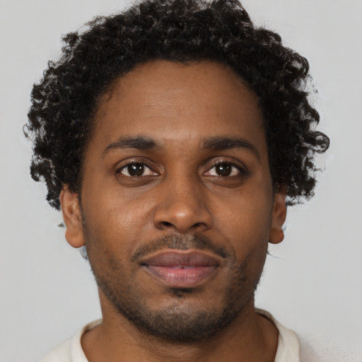 Neutral black young-adult male with short  brown hair and brown eyes