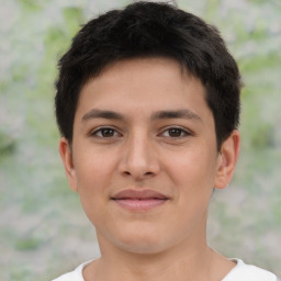 Joyful latino young-adult male with short  brown hair and brown eyes