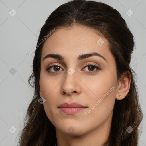 Neutral white young-adult female with long  brown hair and brown eyes