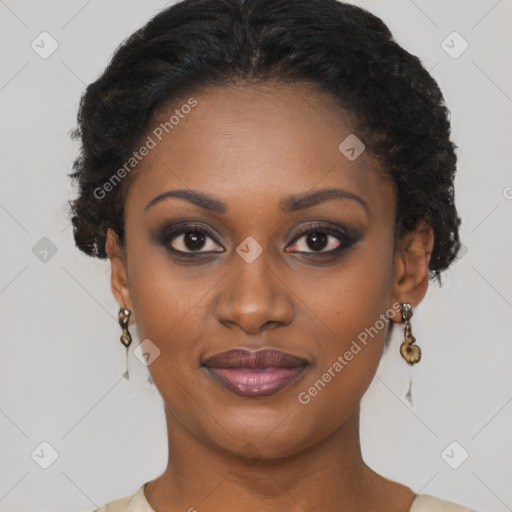 Joyful black young-adult female with short  brown hair and brown eyes