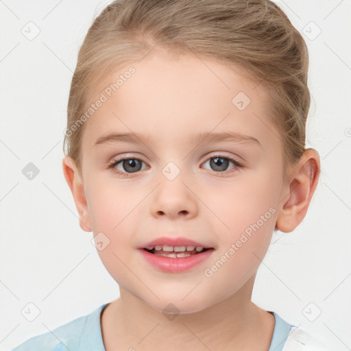 Joyful white child female with short  brown hair and grey eyes