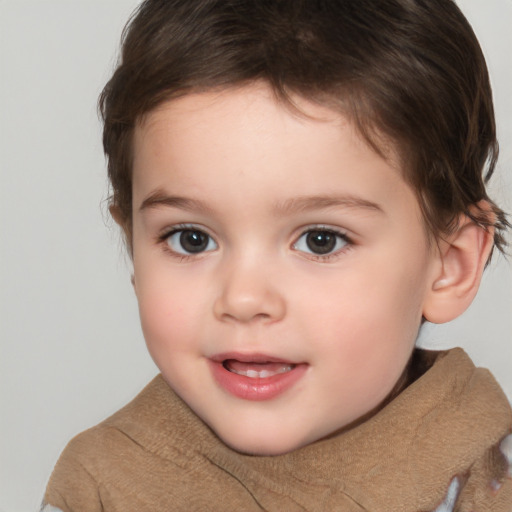 Joyful white child female with short  brown hair and brown eyes