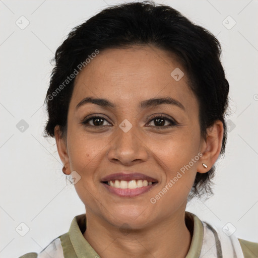 Joyful latino young-adult female with short  brown hair and brown eyes