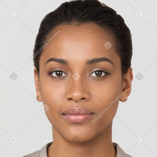 Joyful latino young-adult female with short  black hair and brown eyes