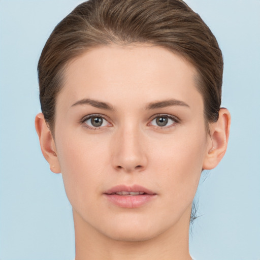 Neutral white young-adult female with short  brown hair and brown eyes