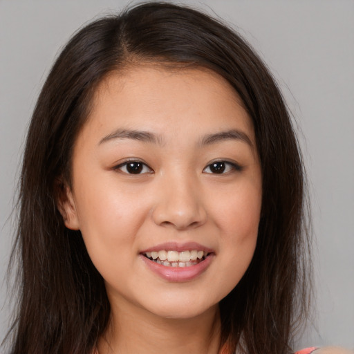 Joyful white young-adult female with medium  brown hair and brown eyes