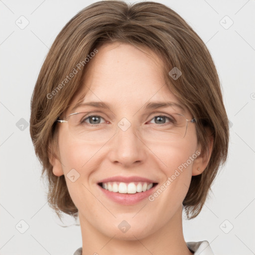 Joyful white young-adult female with medium  brown hair and green eyes