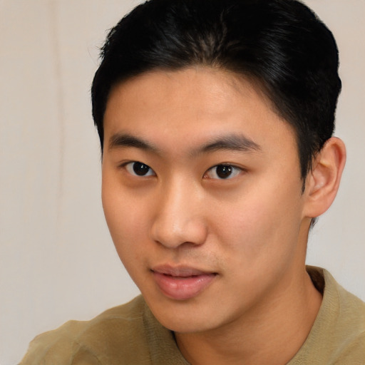 Neutral asian young-adult male with short  brown hair and brown eyes