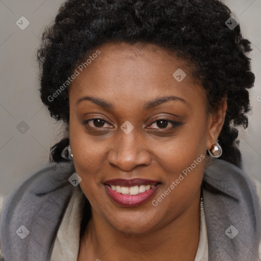 Joyful black young-adult female with long  brown hair and brown eyes