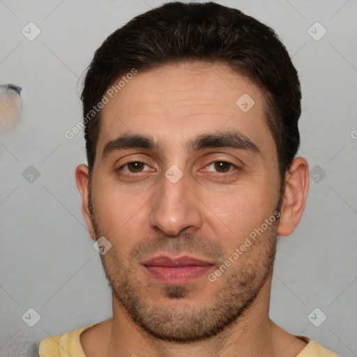 Joyful white young-adult male with short  brown hair and brown eyes