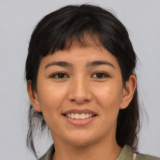 Joyful asian young-adult female with medium  brown hair and brown eyes