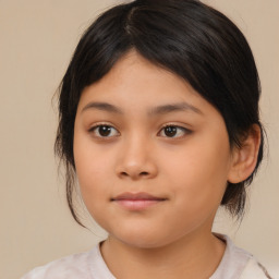 Joyful asian child female with medium  brown hair and brown eyes