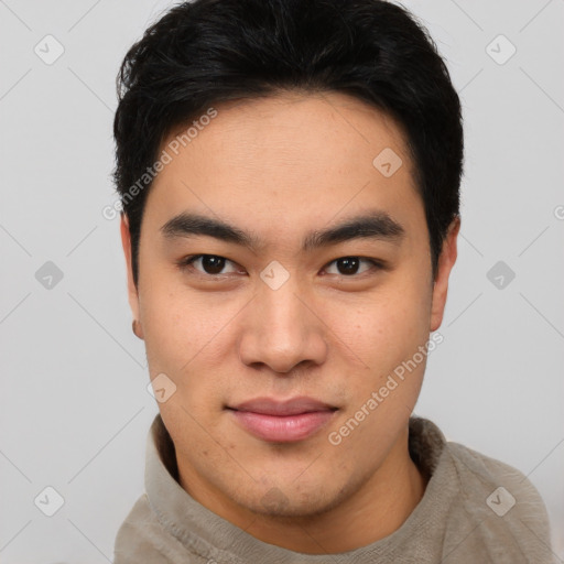 Joyful asian young-adult male with short  black hair and brown eyes