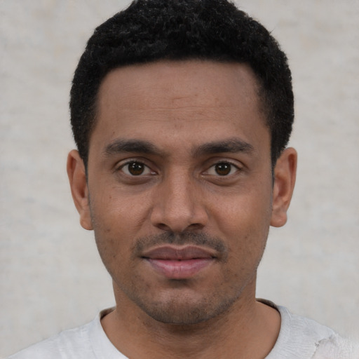 Neutral latino young-adult male with short  black hair and brown eyes