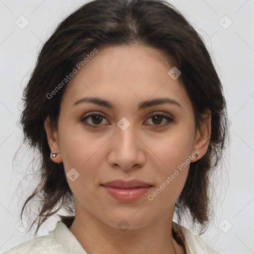 Joyful latino young-adult female with medium  brown hair and brown eyes