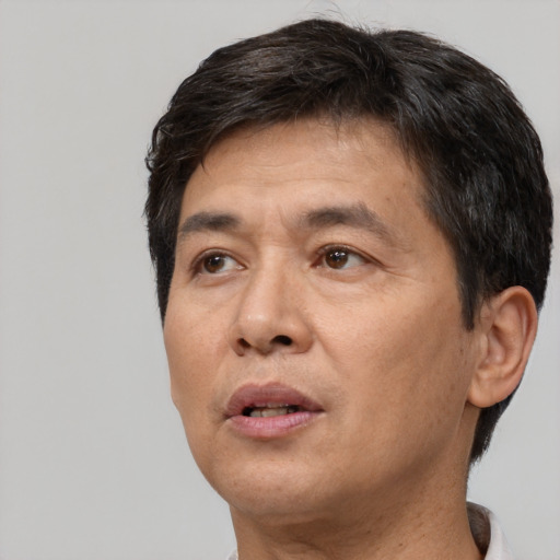 Neutral white adult male with short  brown hair and brown eyes