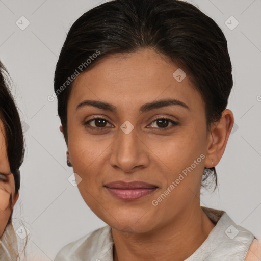 Joyful white young-adult female with medium  brown hair and brown eyes