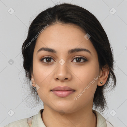 Joyful latino young-adult female with medium  black hair and brown eyes