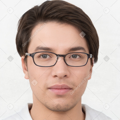 Neutral white young-adult male with short  brown hair and brown eyes