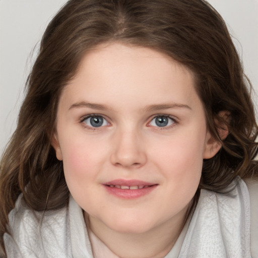 Joyful white child female with medium  brown hair and brown eyes