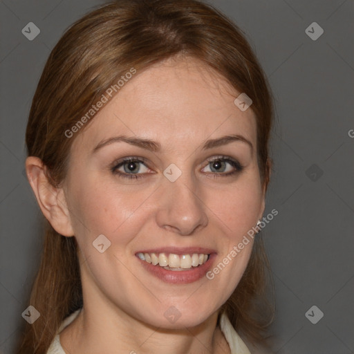 Joyful white young-adult female with medium  brown hair and blue eyes