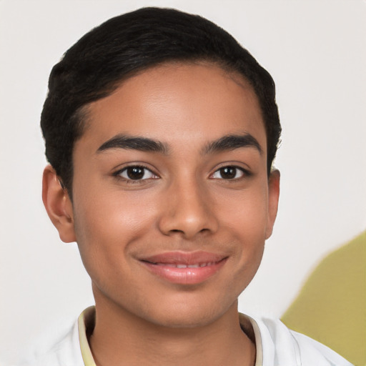 Joyful latino young-adult male with short  brown hair and brown eyes